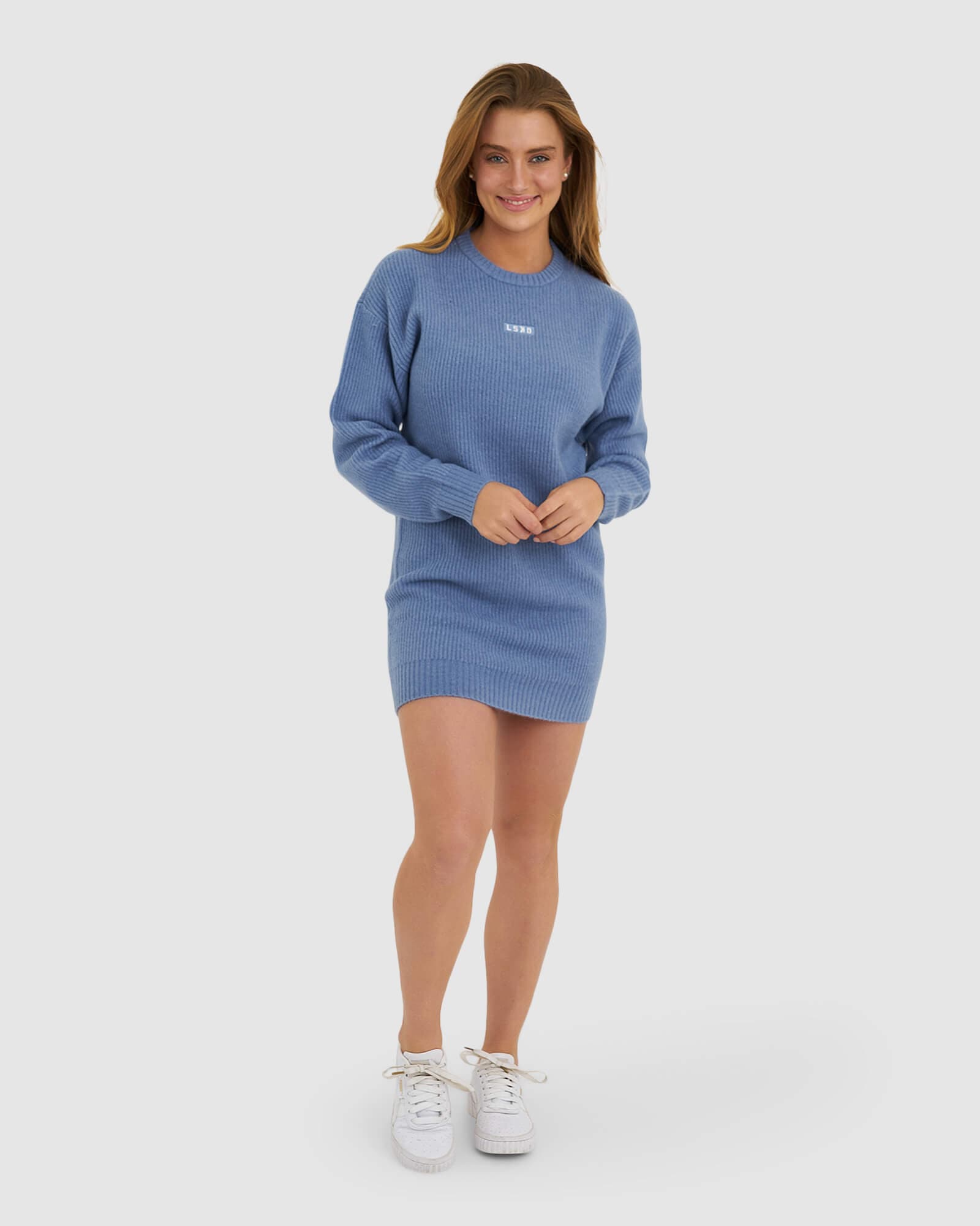 Model wearing Cornerstone Knit Sweater Dress - Dusty Blue
