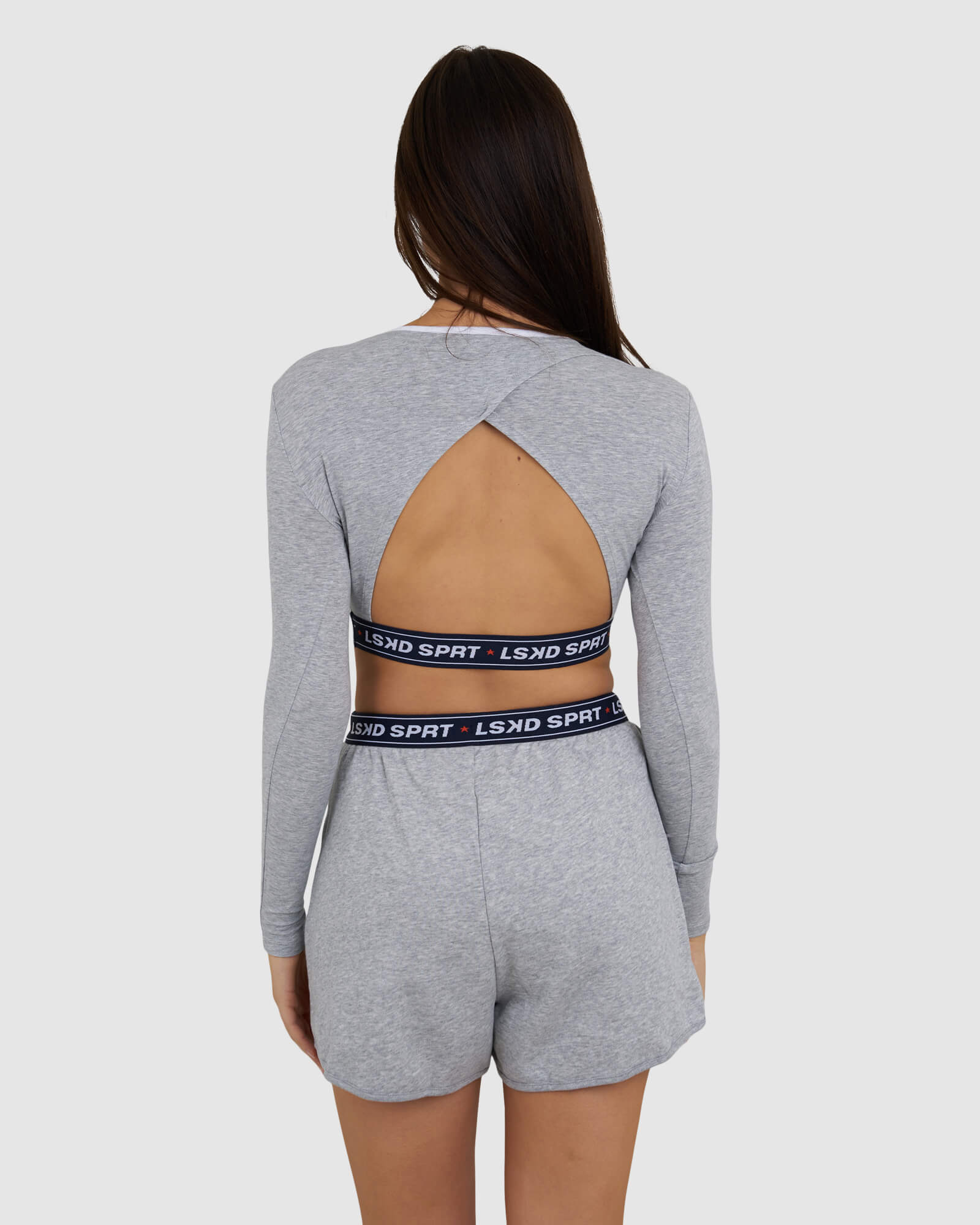 Model wearing Challenge Lounge LS Top - Lt Grey Marl