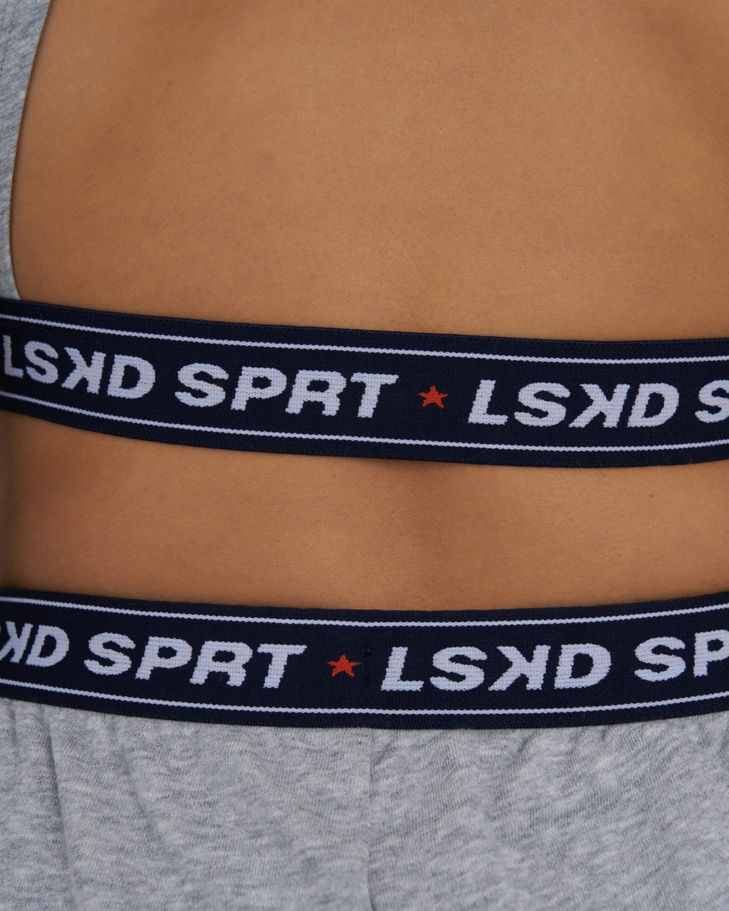 Model wearing Challenge Lounge LS Top - Lt Grey Marl