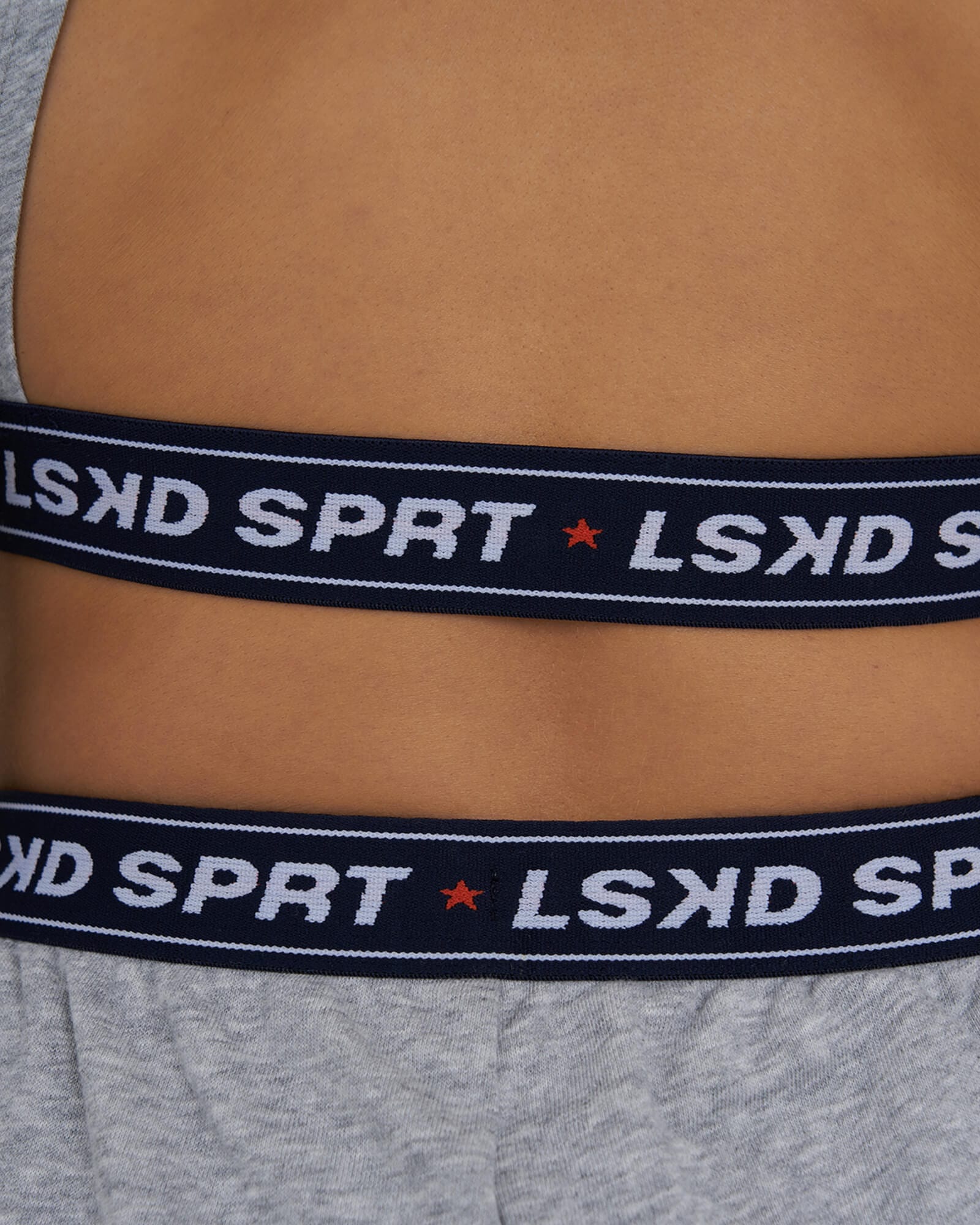 Model wearing Challenge Lounge LS Top - Lt Grey Marl