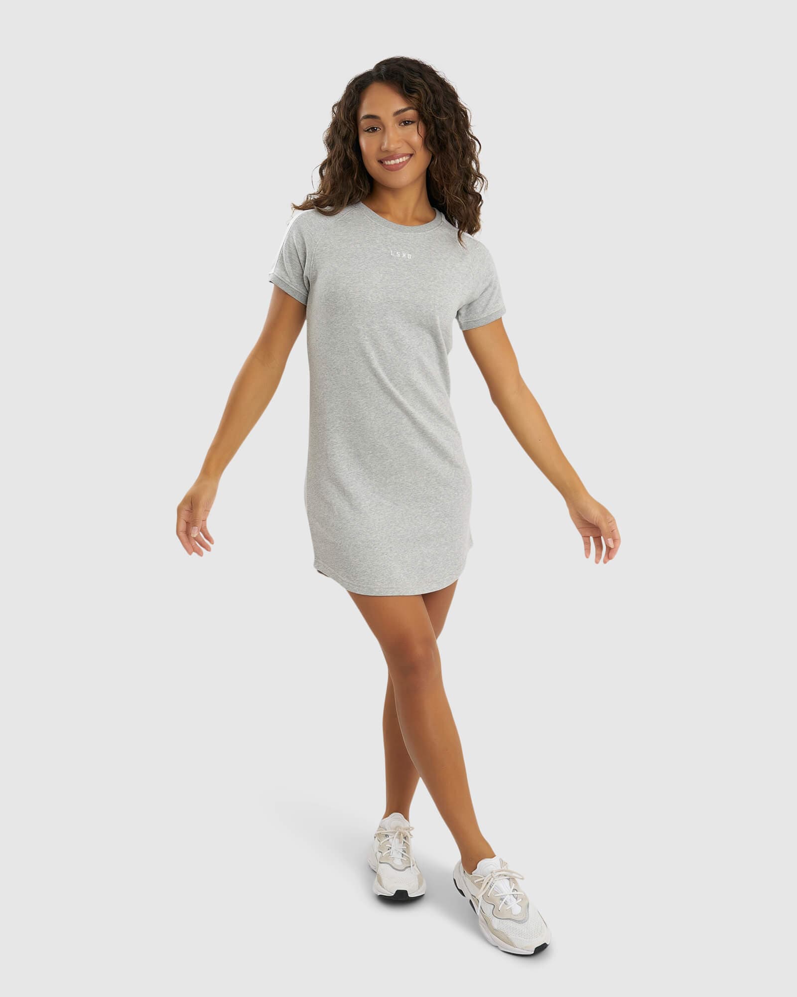 Model wearing Shooter Tee Dress - Lt Grey Marl
