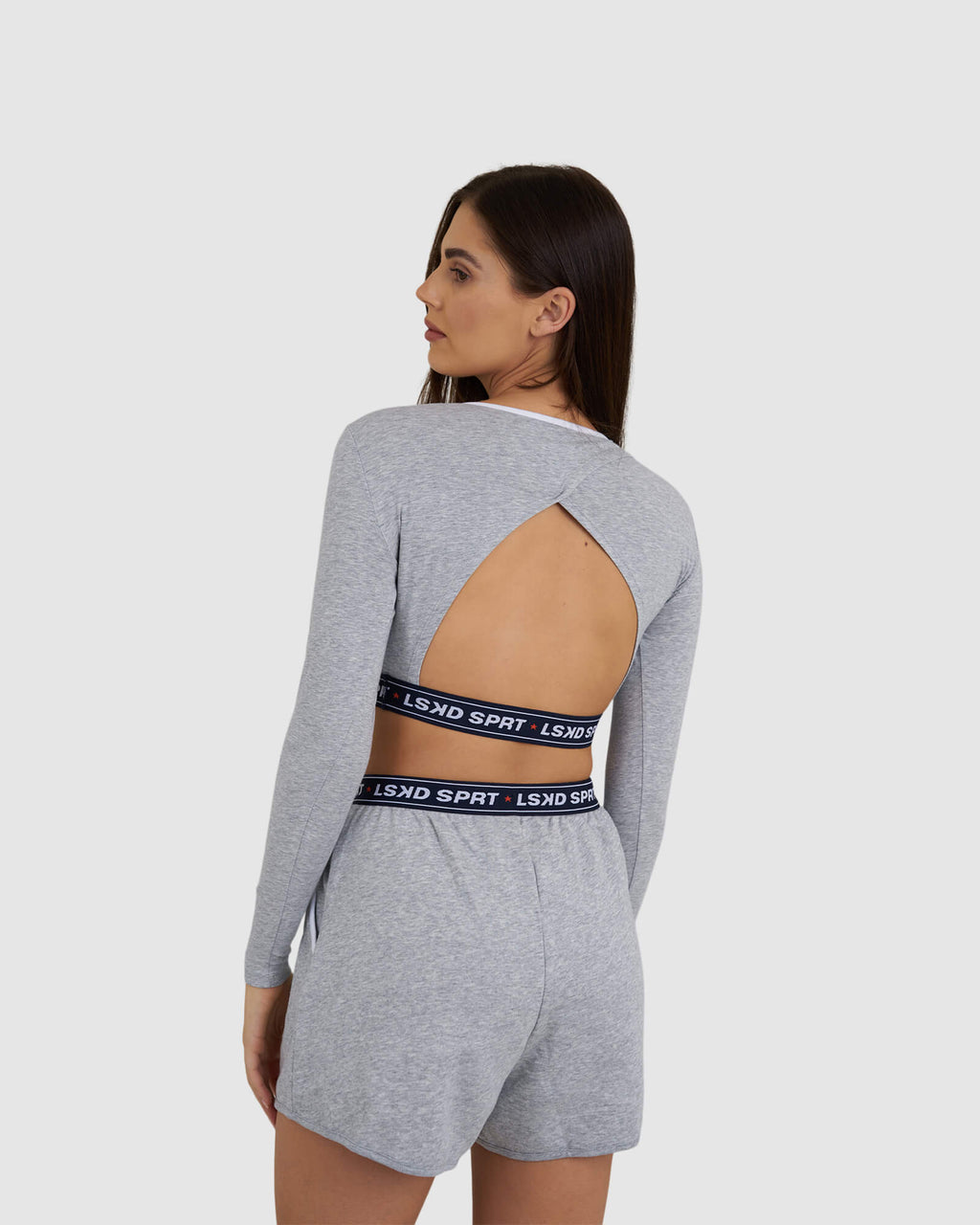 Model wearing Challenge Lounge LS Top - Lt Grey Marl