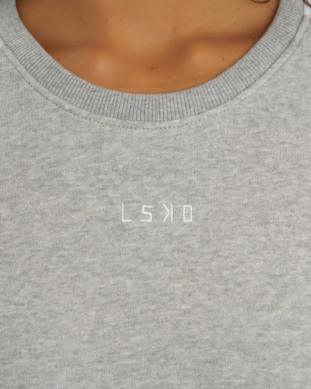 Model wearing Shooter Tee Dress - Lt Grey Marl