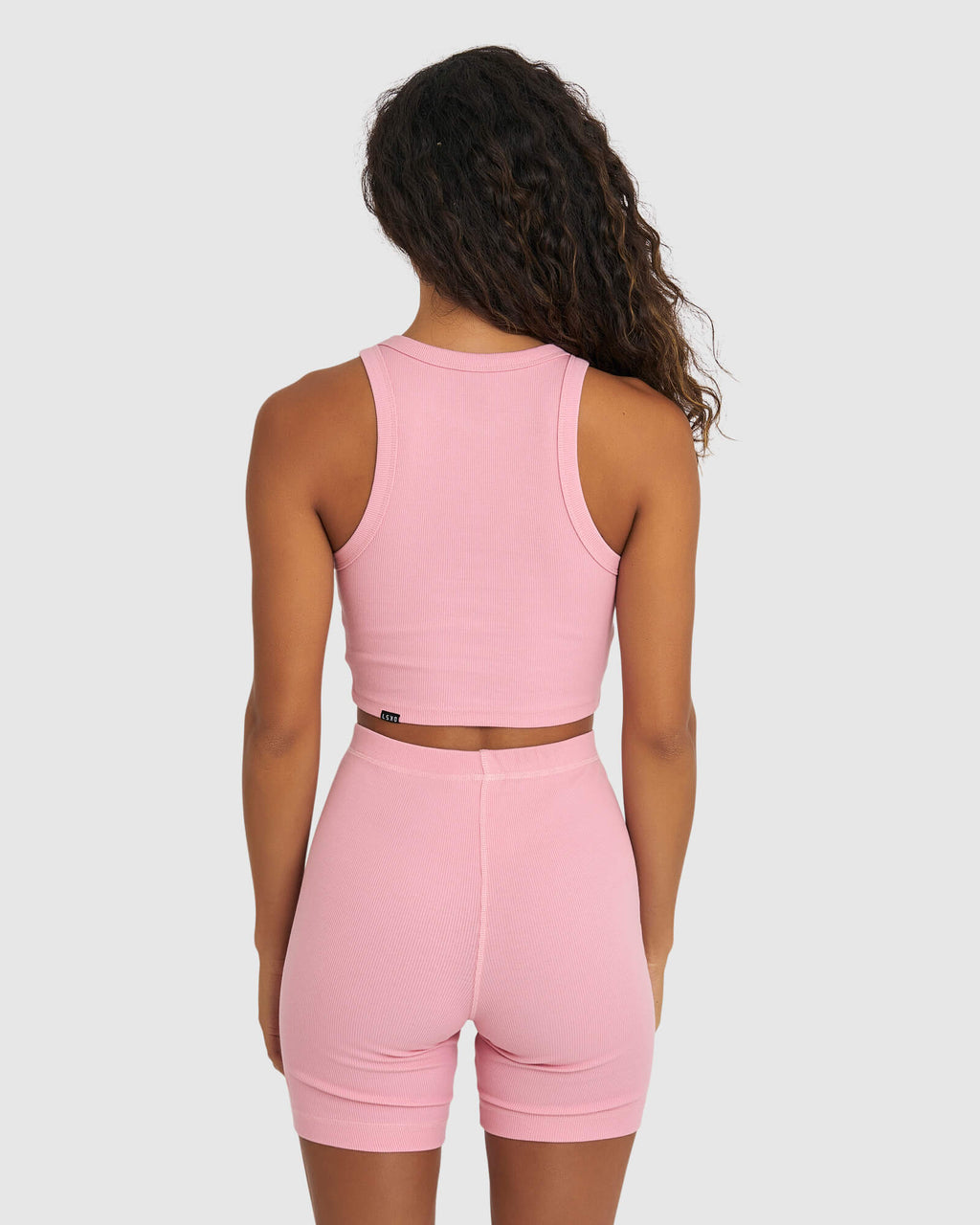 Model wearing Crop Field Ribbed Tank - Sweet Pink
