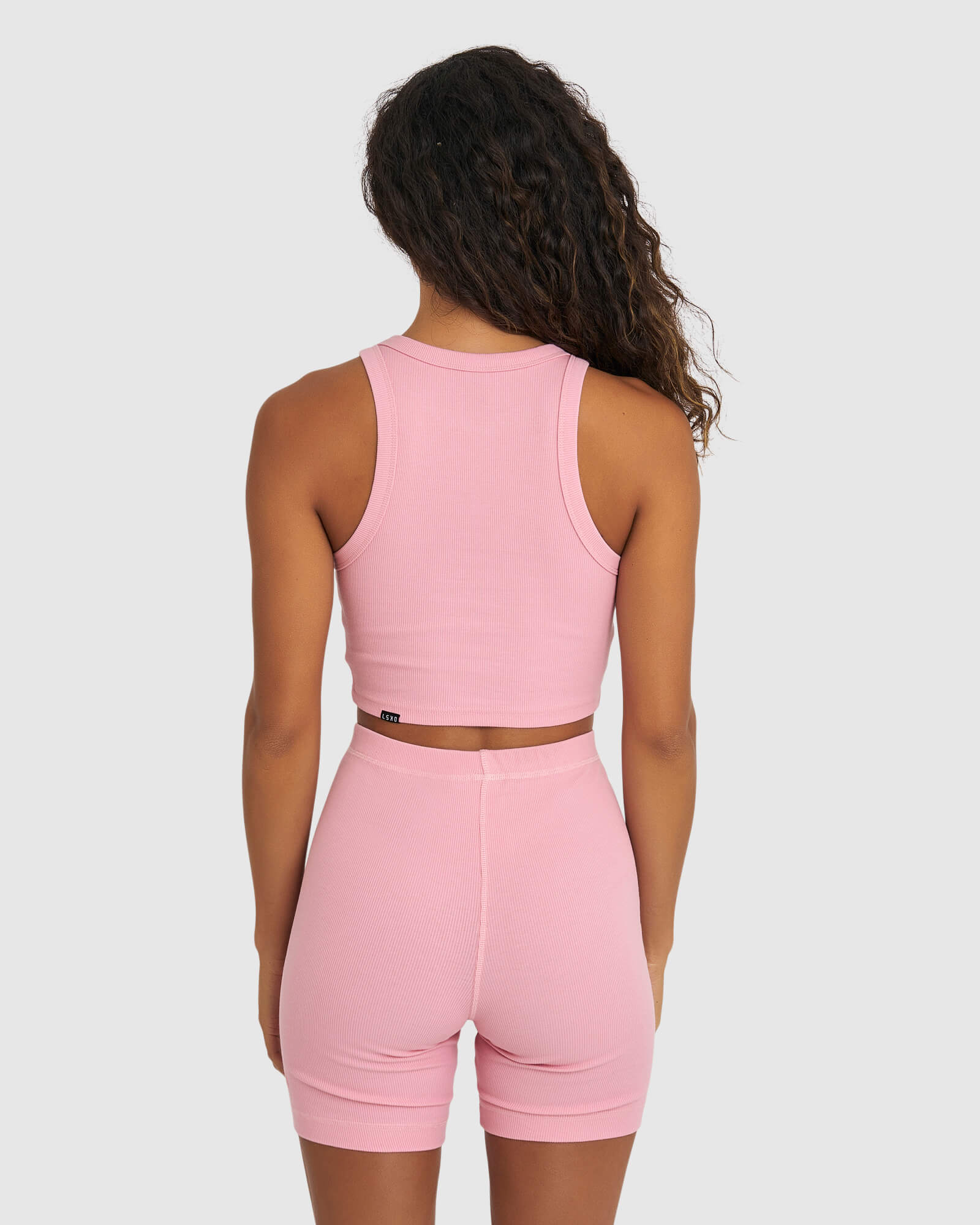 Model wearing Crop Field Ribbed Tank - Sweet Pink
