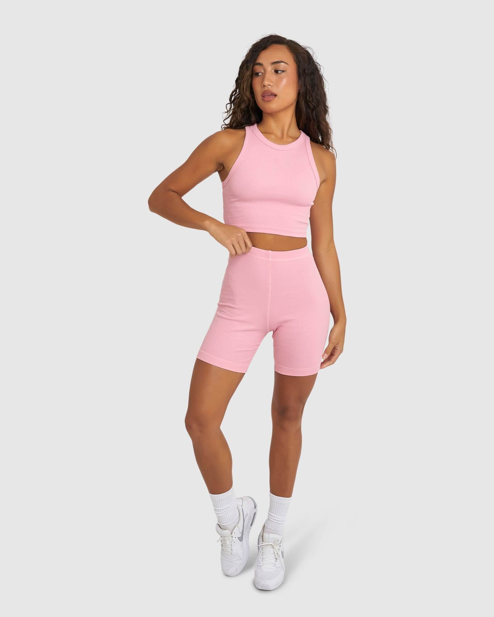 Model wearing Signs Ribbed Short - Sweet Pink