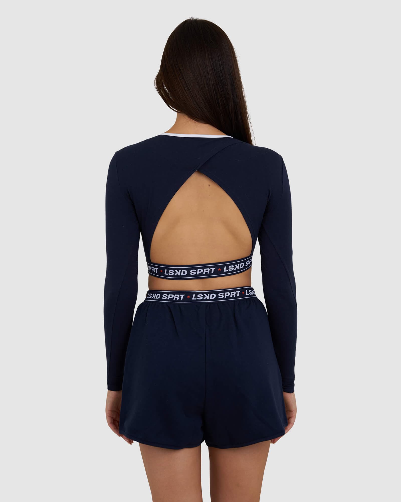 Model wearing Challenge Lounge LS Top - Navy