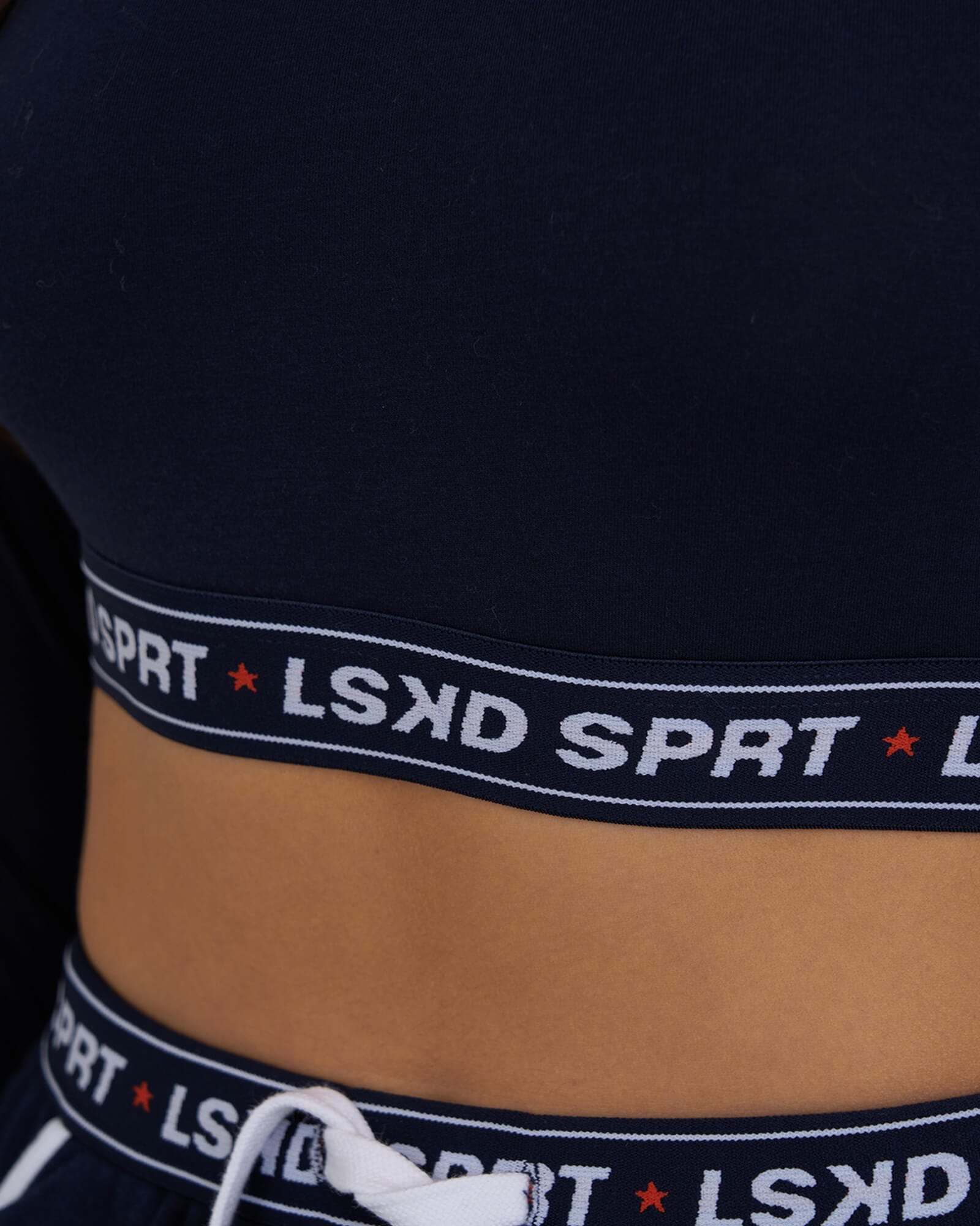 Model wearing Challenge Lounge LS Top - Navy