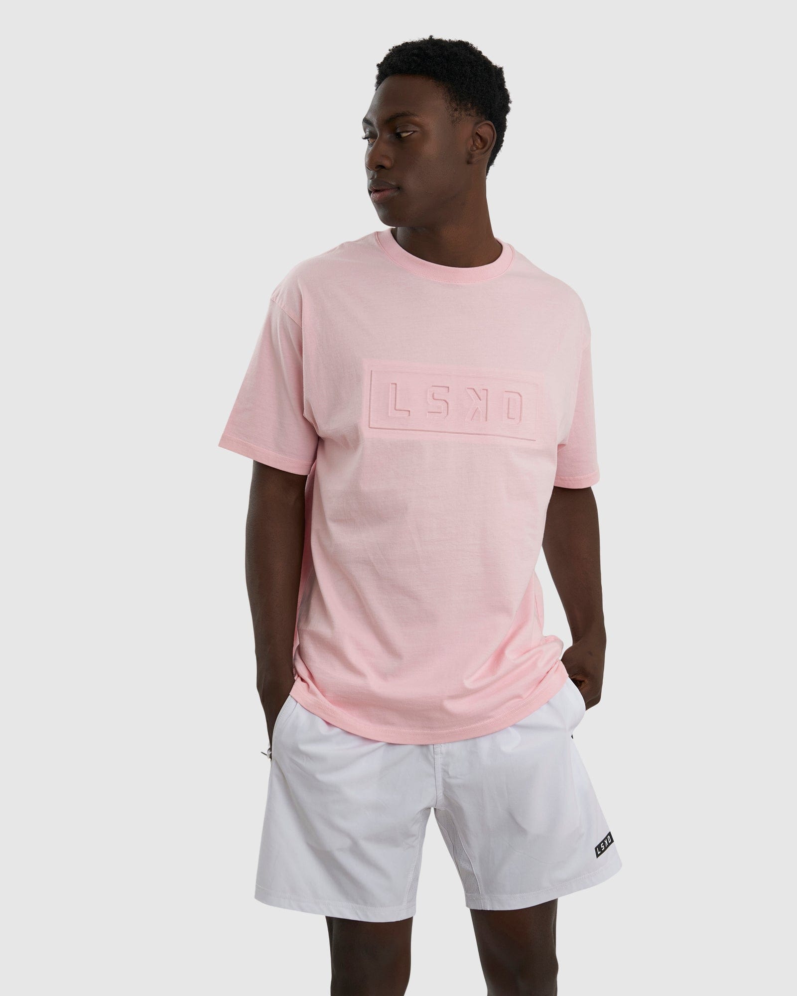 Model wearing Imprint Tee Oversize - Petal Pink