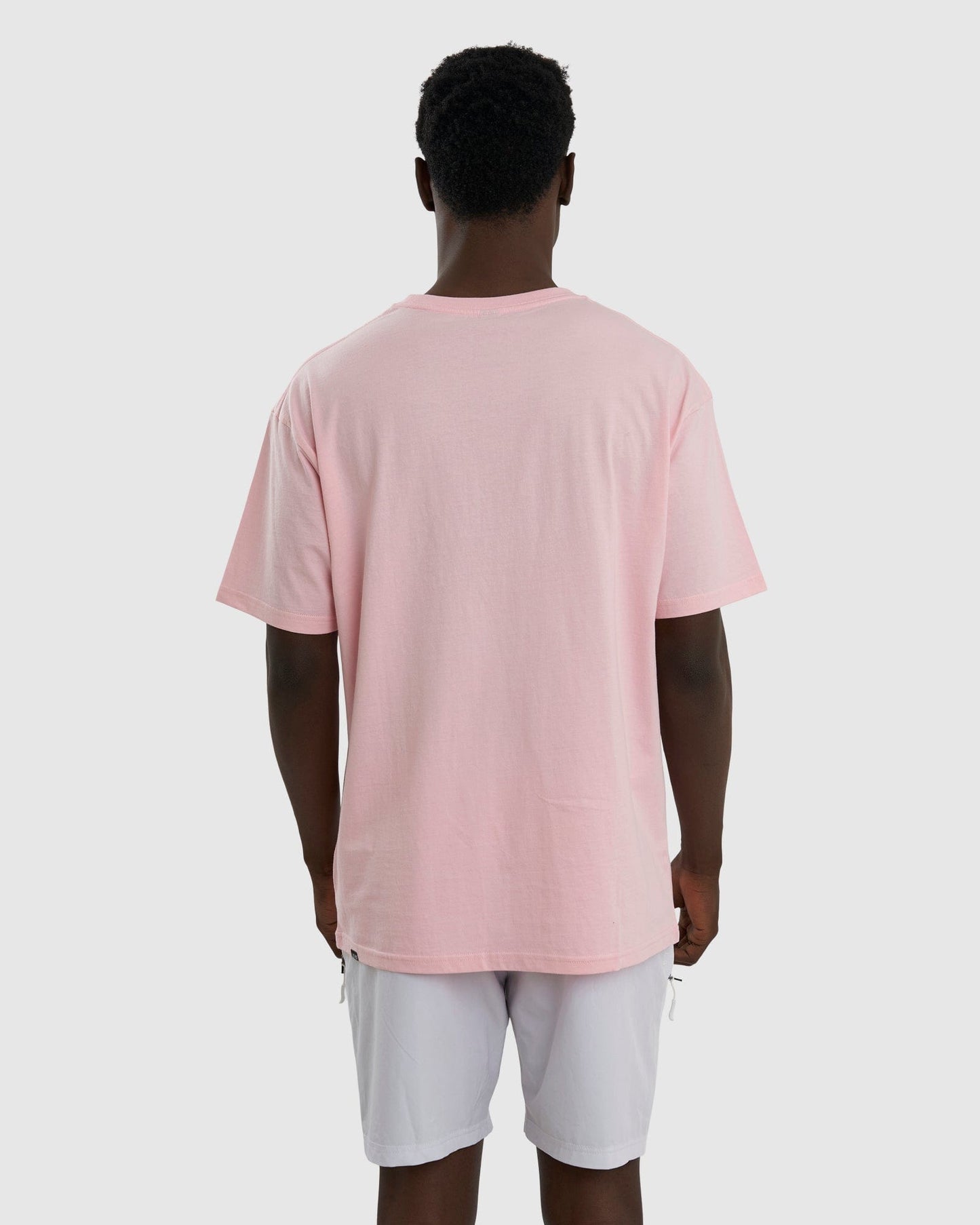 Model wearing Imprint Tee Oversize - Petal Pink