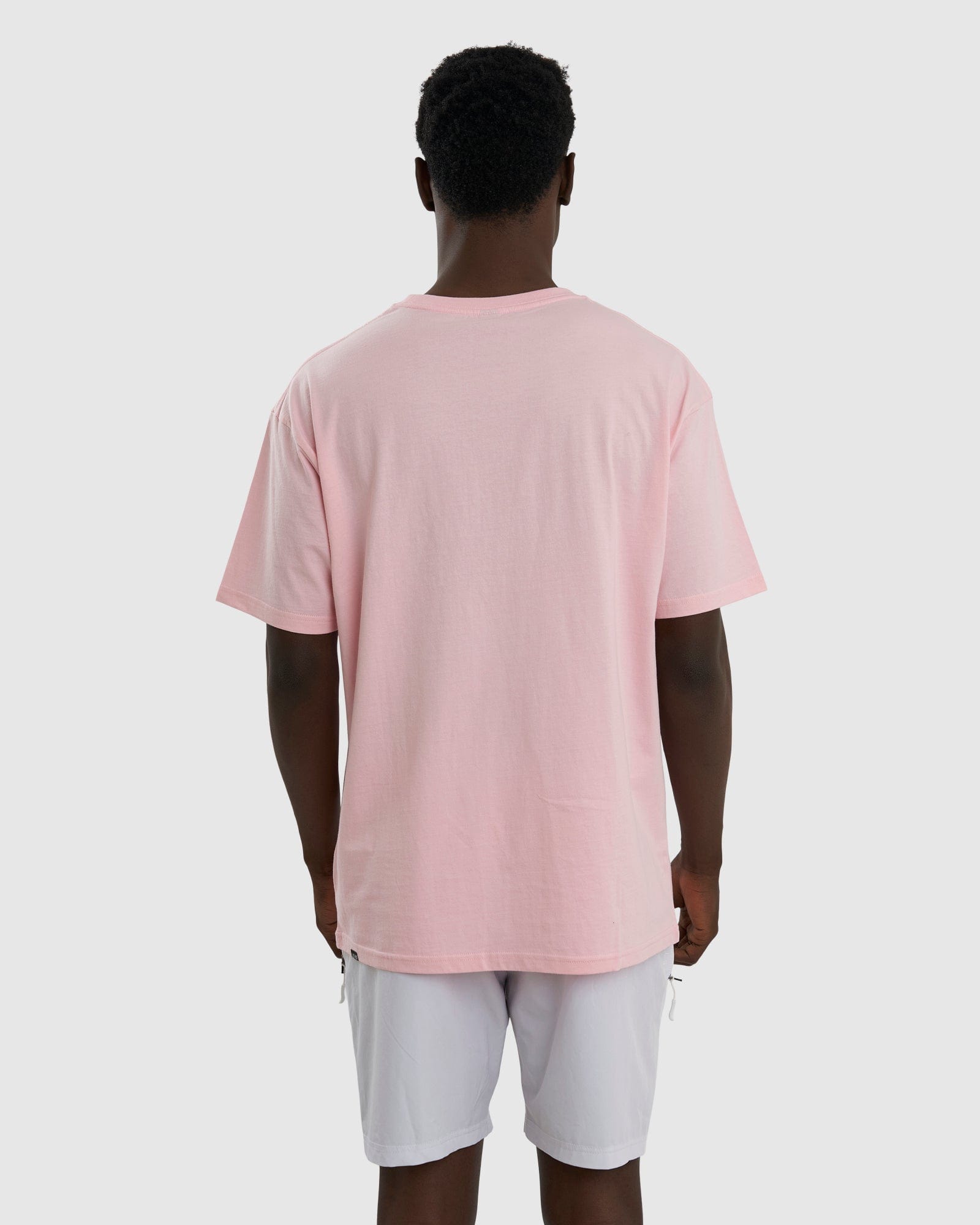 Model wearing Imprint Tee Oversize - Petal Pink