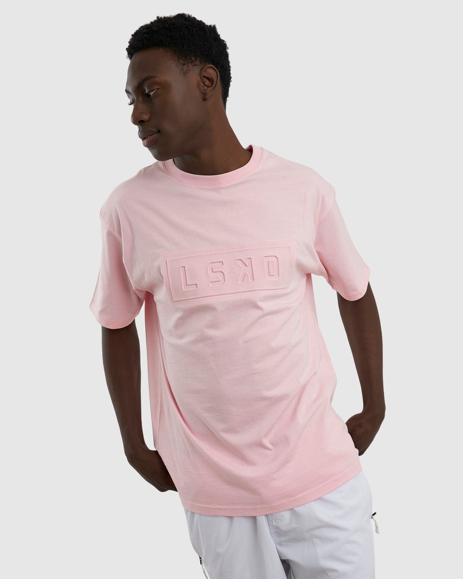 Model wearing Imprint Tee Oversize - Petal Pink