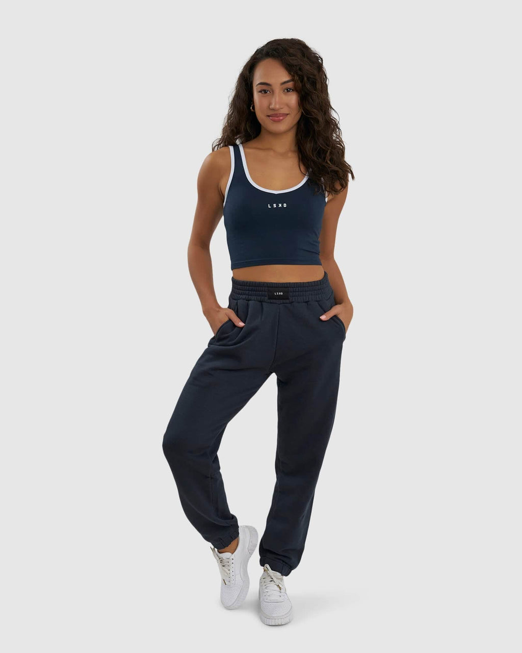 Model wearing Knockout Tank - Carbon