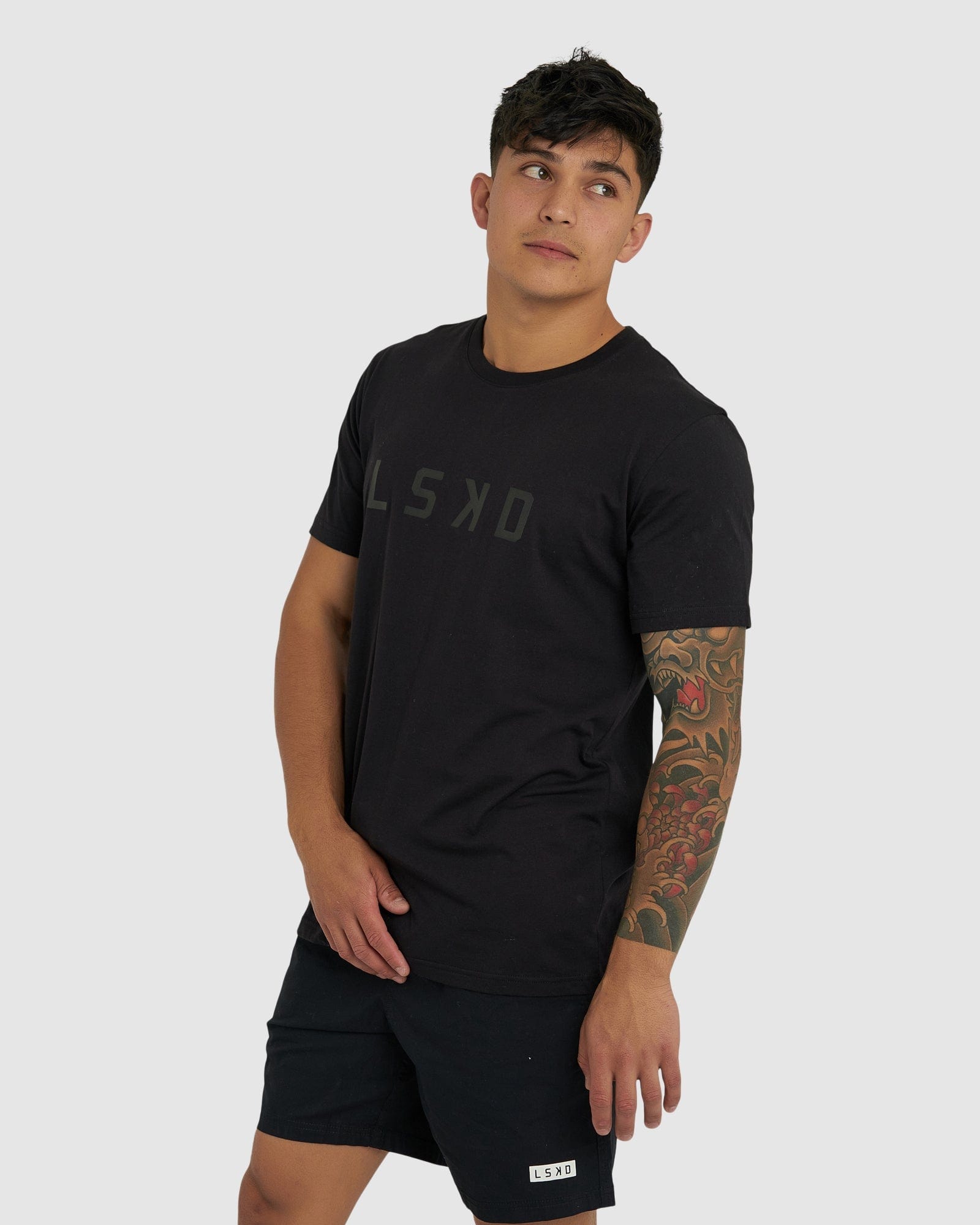 Model wearing Structure Tee - Black-Black