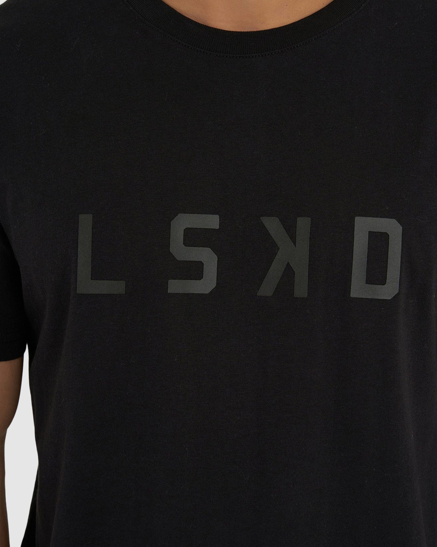 Model wearing Structure Tee - Black-Black