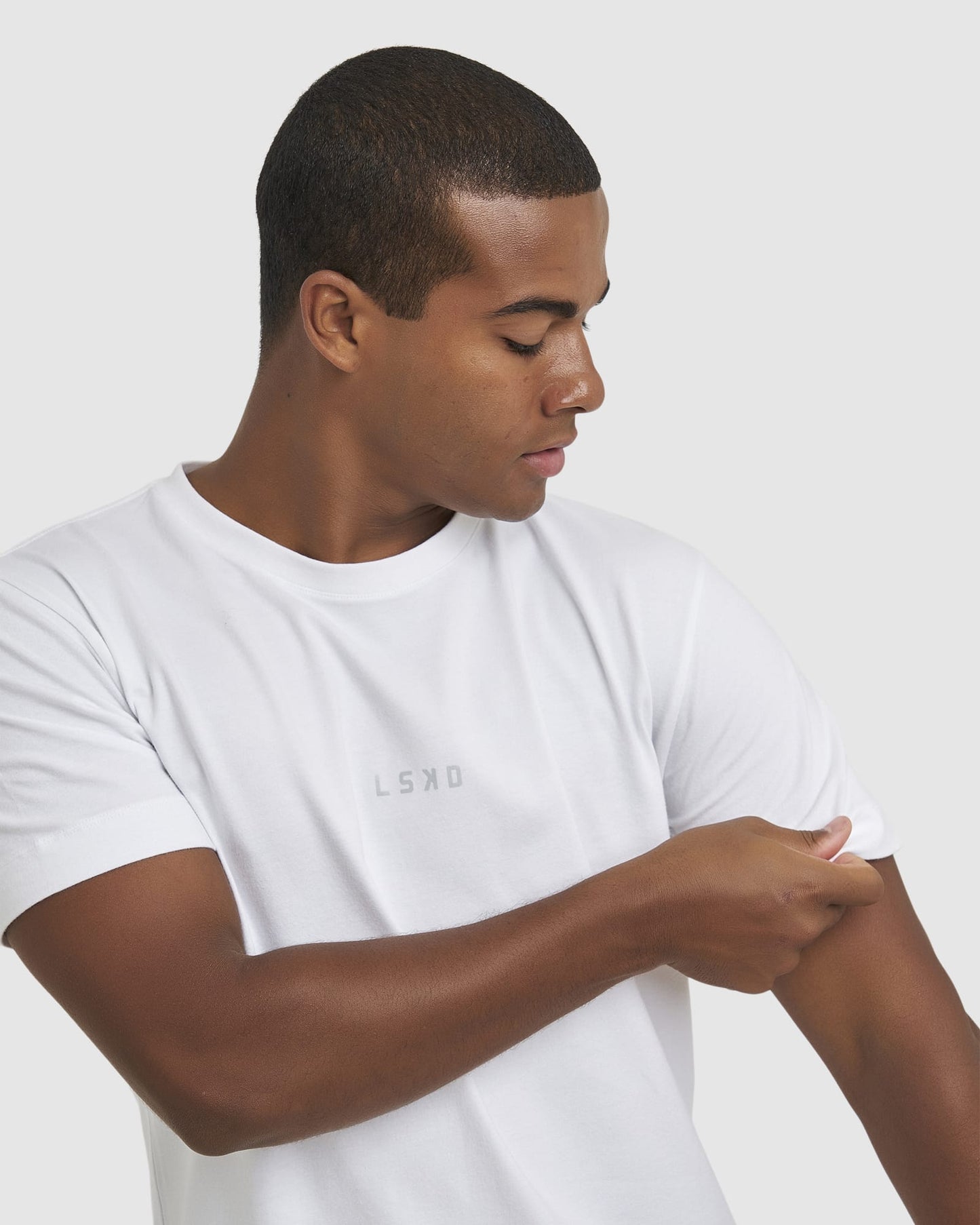 Model wearing Run Club FLXDRY Performance Tee - White-Reflective