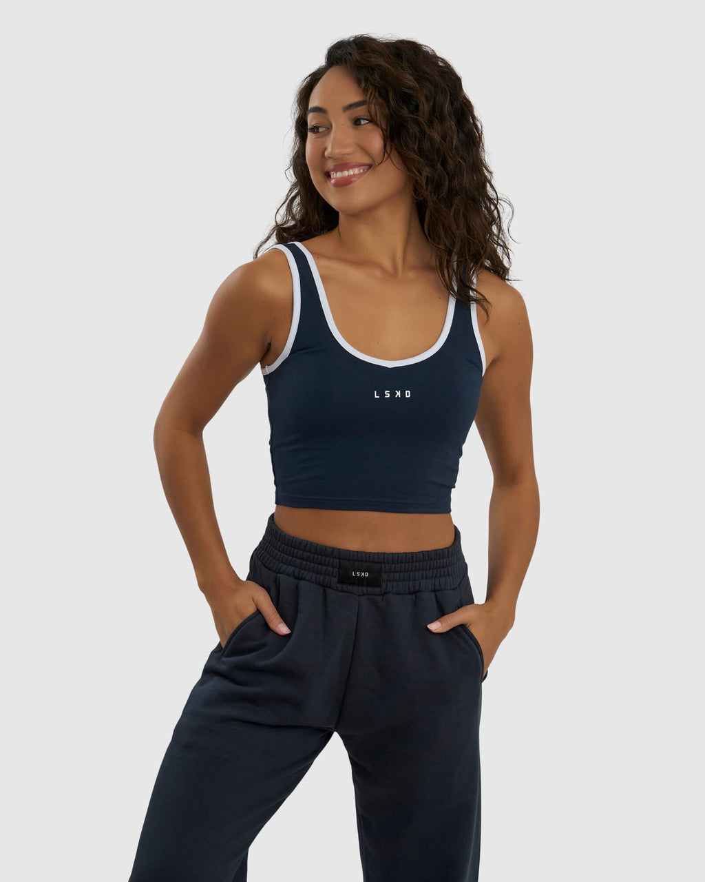 Model wearing Knockout Tank - Carbon