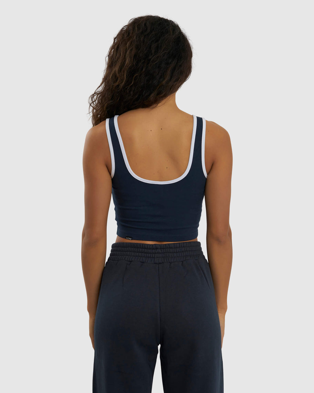 Model wearing Knockout Tank - Carbon