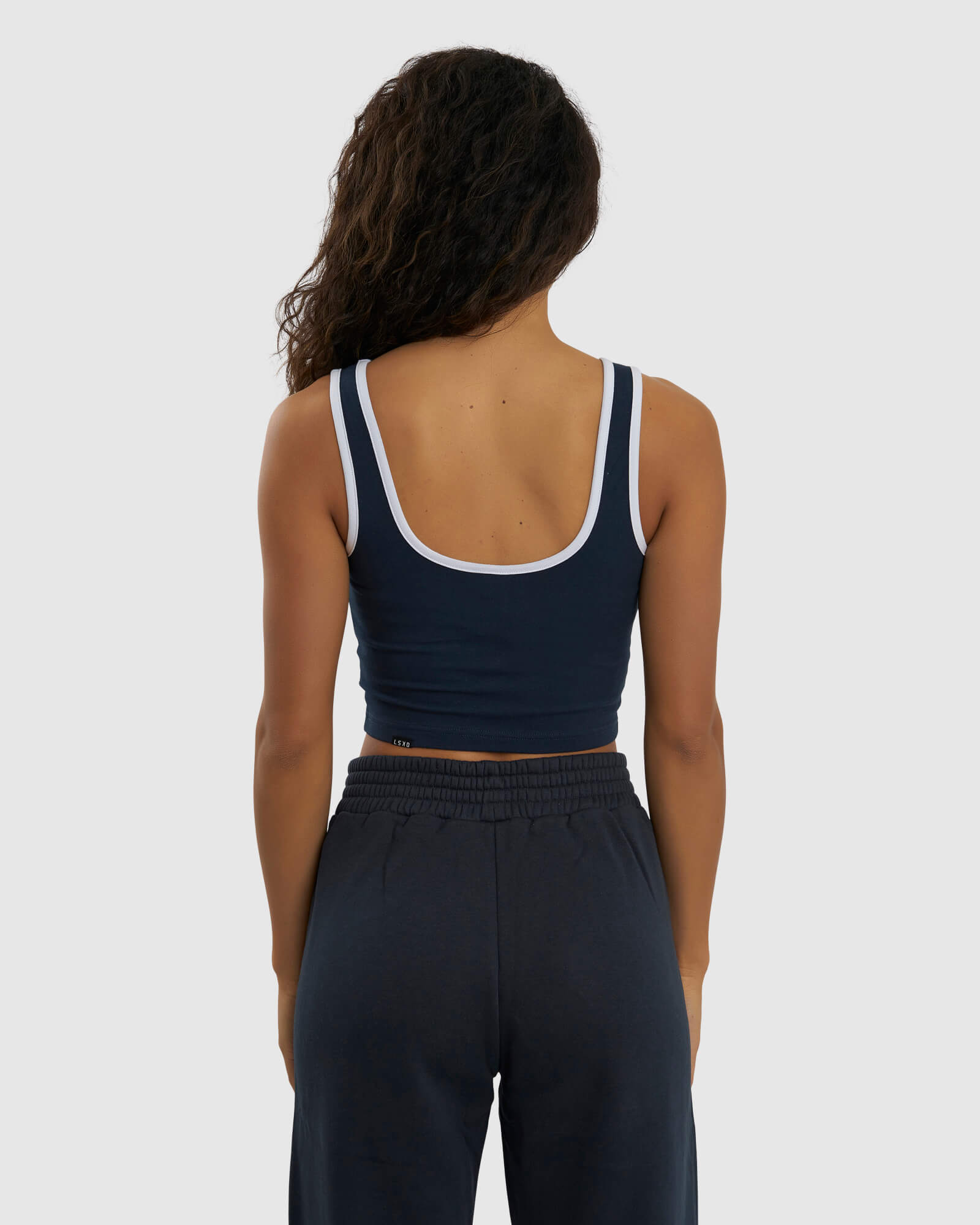 Model wearing Knockout Tank - Carbon