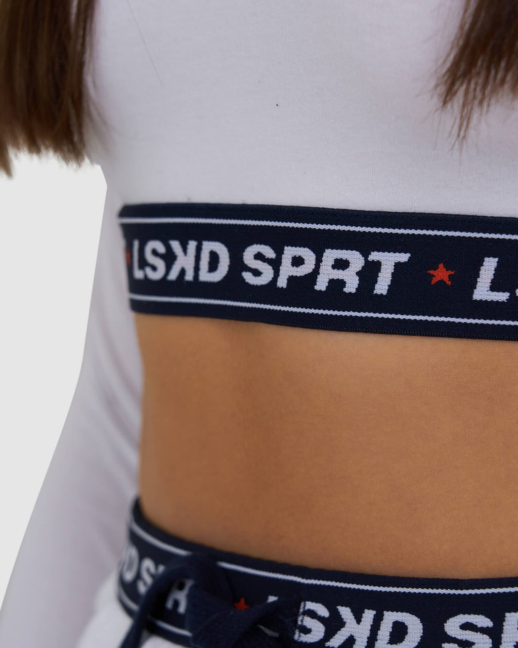 Model wearing Challenge Lounge LS Top - White