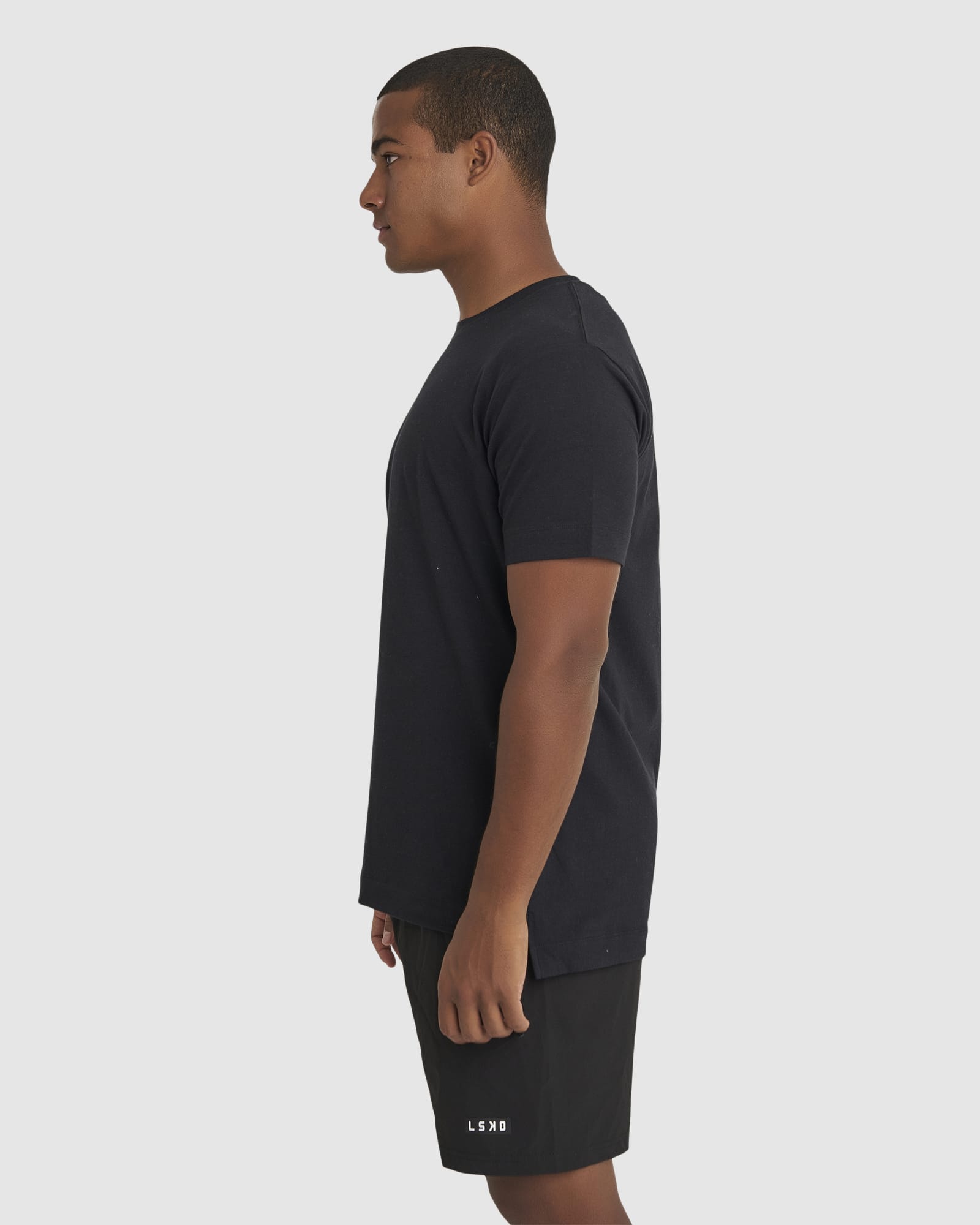 Model wearing Run Club FLXDRY Performance Tee - Black-Reflective