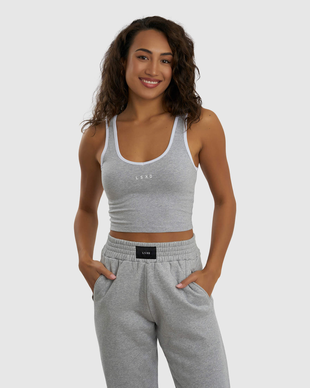 Model wearing Knockout Tank - Lt Grey Marl