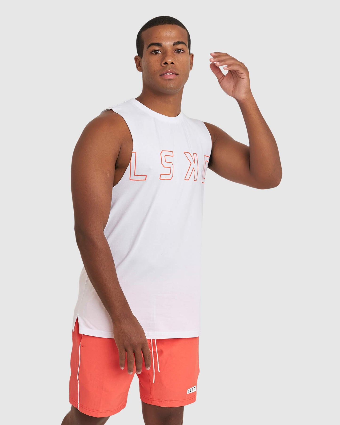 Model wearing Expand FLXCotton Training Fit Tank - White-Fruit Punch