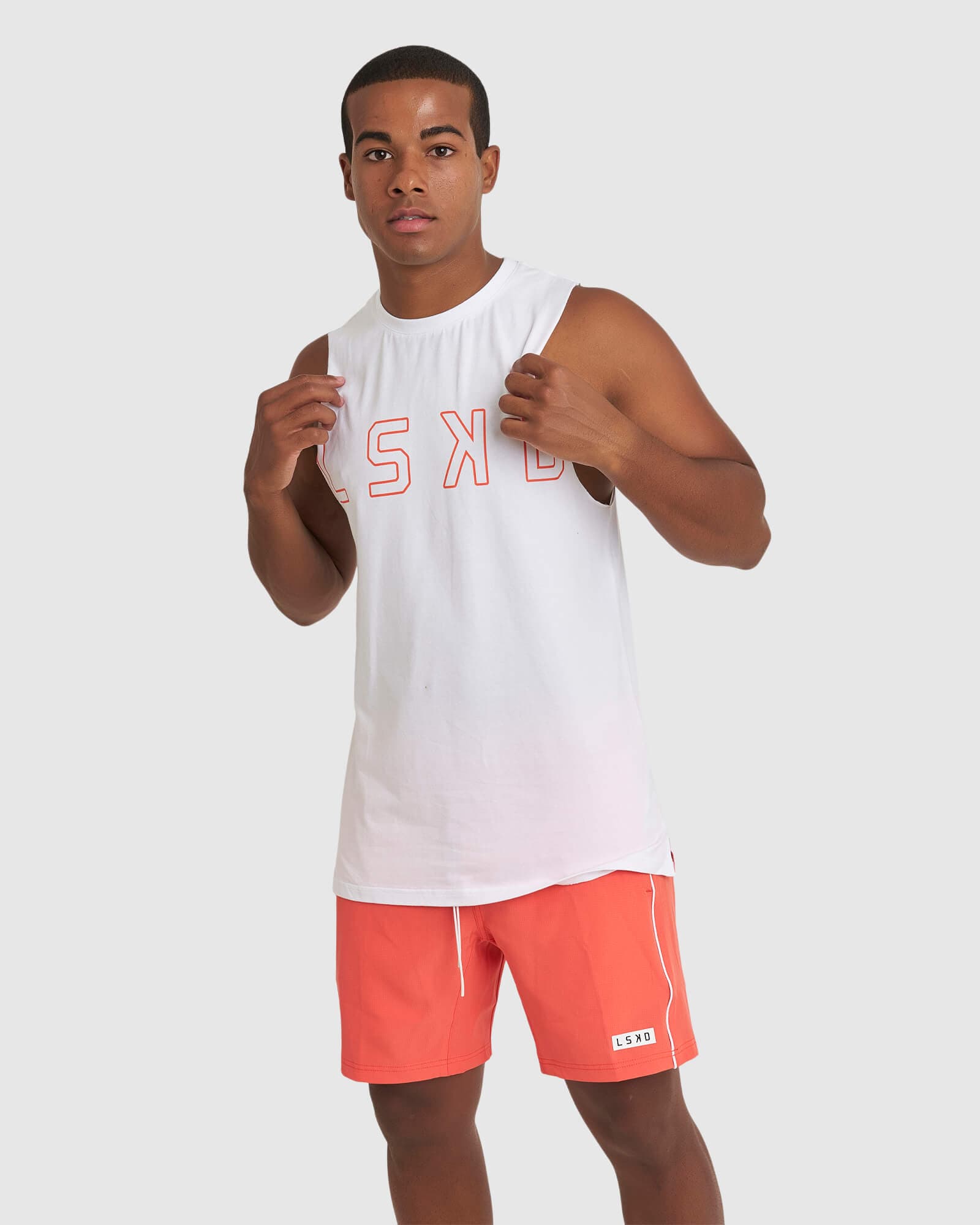Model wearing Expand FLXCotton Training Fit Tank - White-Fruit Punch