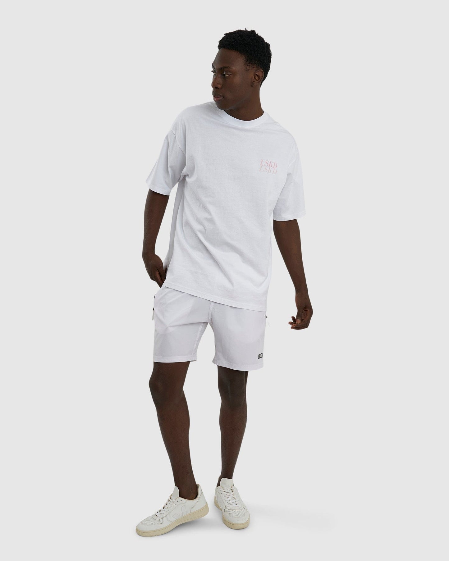 Model wearing Aurora Tee Oversized - White