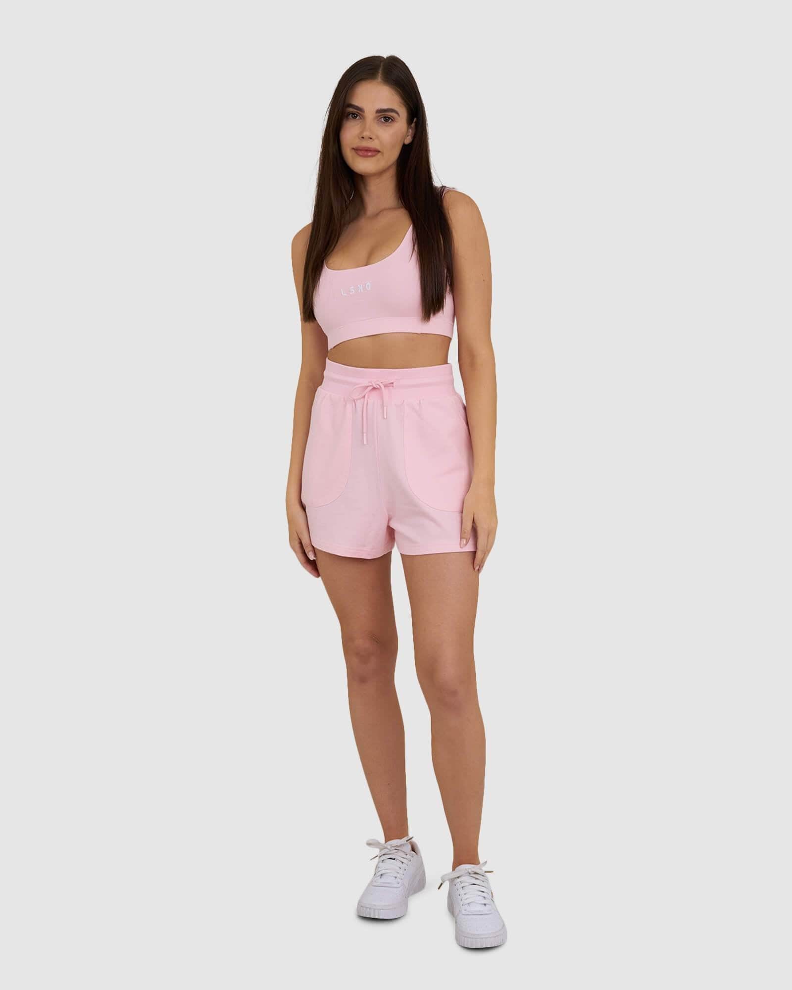 Model wearing Field Shorts - Petal Pink