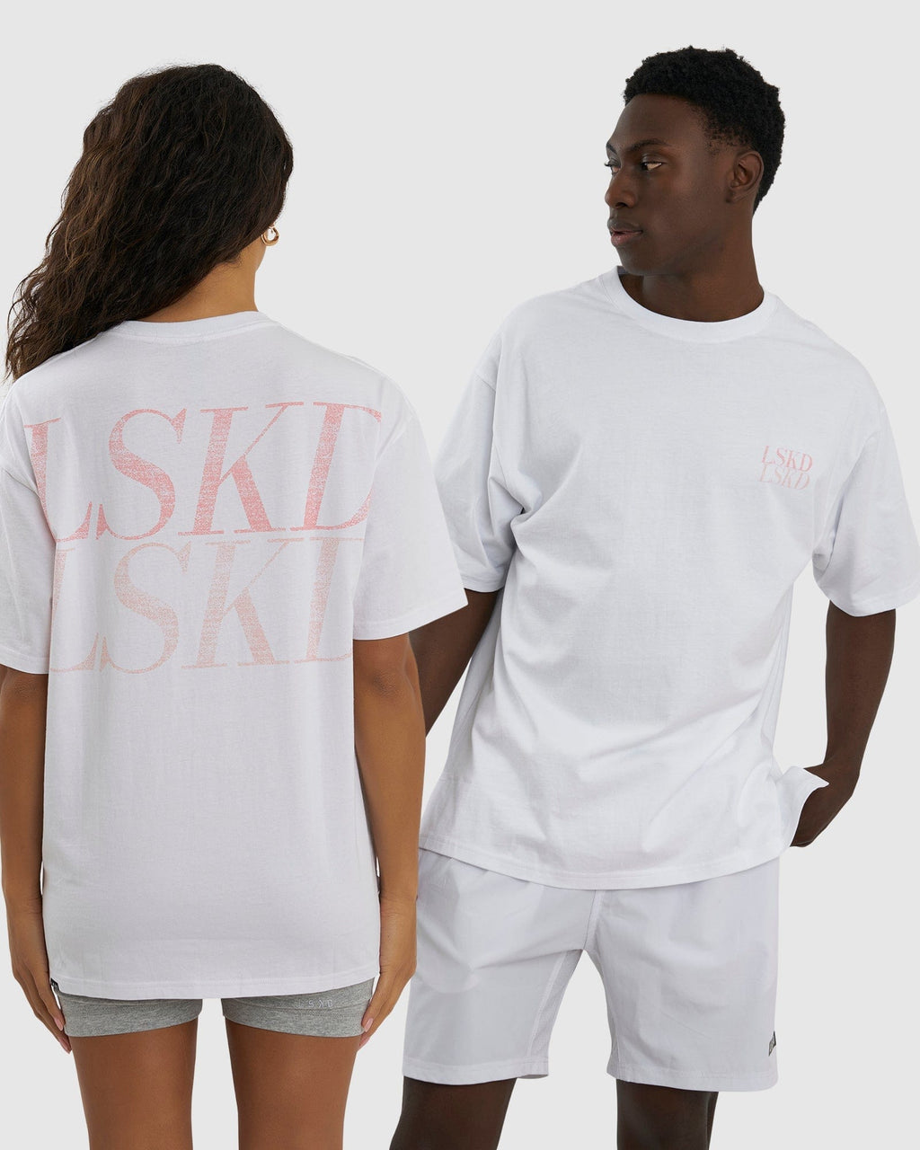 Model wearing Unisex Aurora Tee Oversized - White