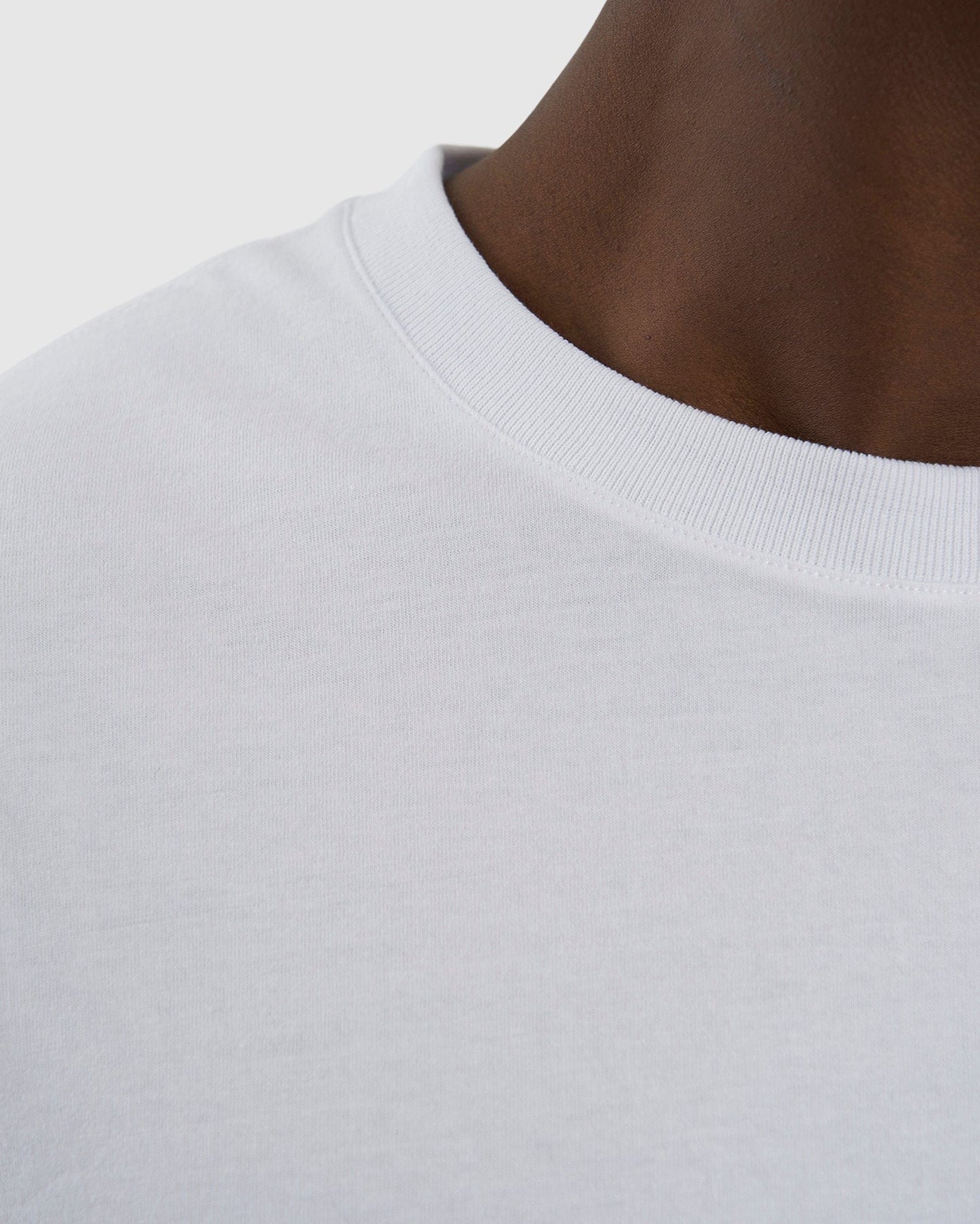 Model wearing Aurora Tee Oversized - White