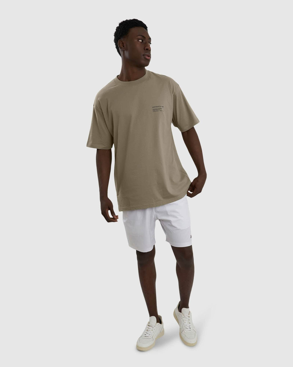 Model wearing Unisex Official Tee Oversize - Laurel Oak