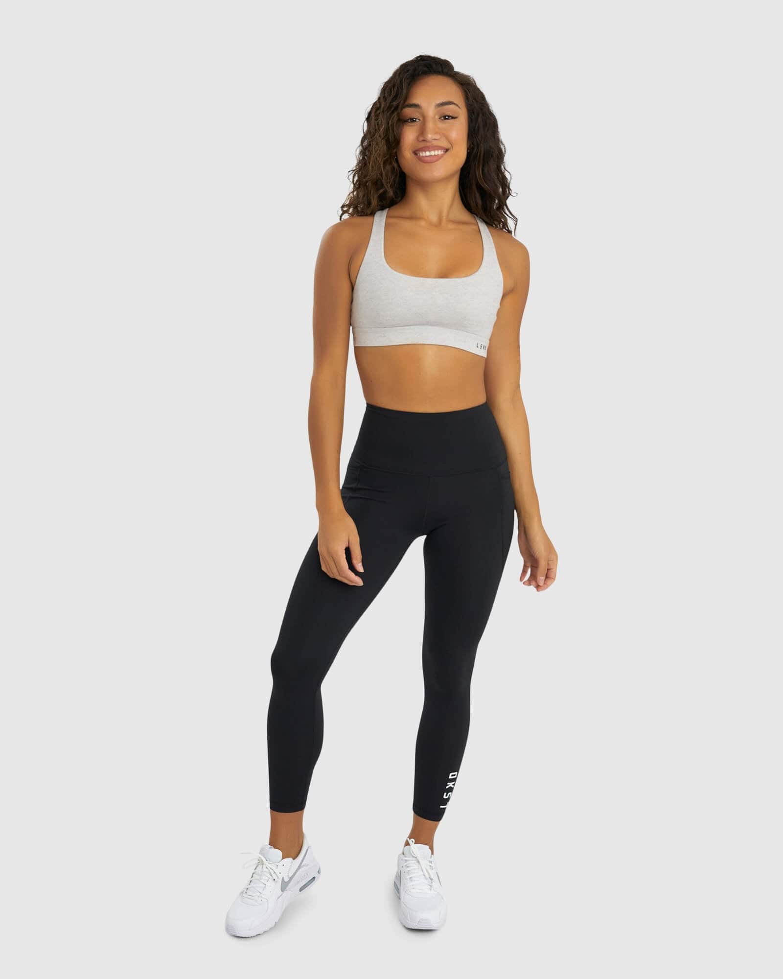 Model wearing Gisele Sports Bra - Lt Grey Marl