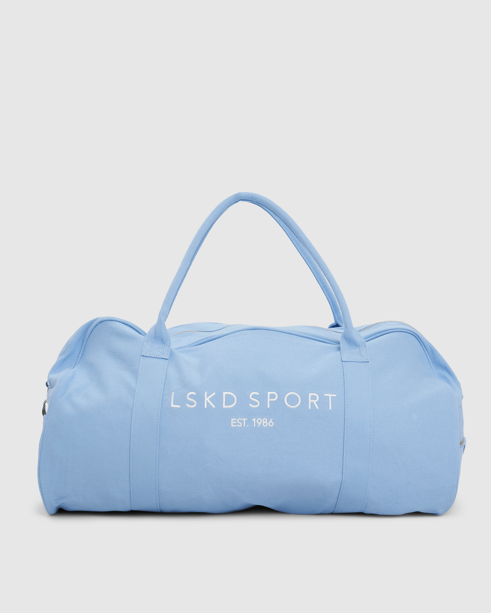 Model wearing Daily Duffle - Baby Blue