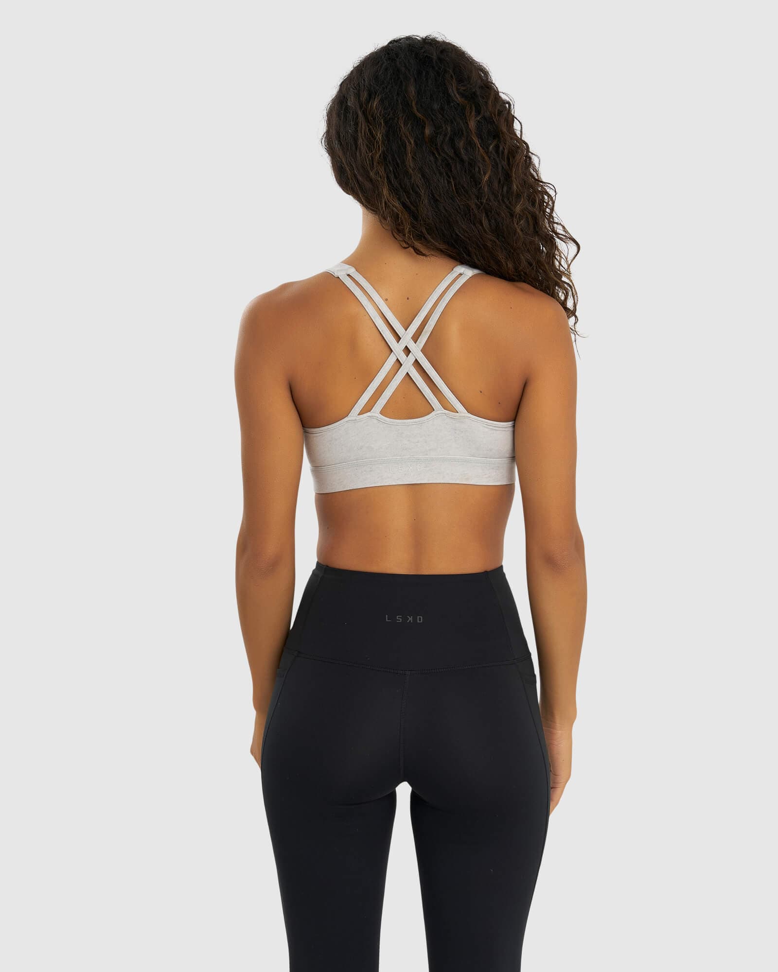 Model wearing Gisele Sports Bra - Lt Grey Marl