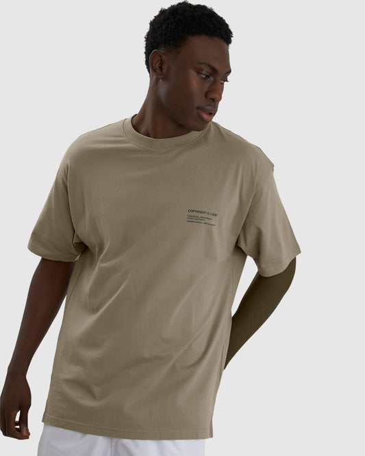 Model wearing Unisex Official Tee Oversize - Laurel Oak