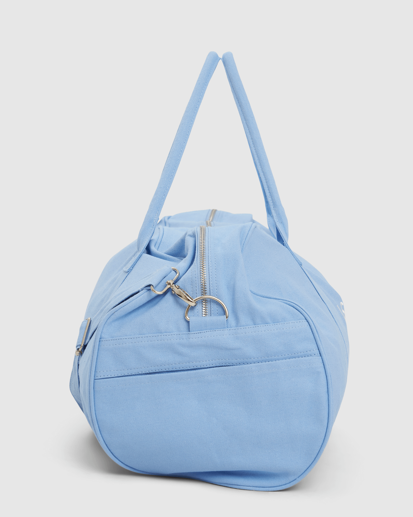 Model wearing Daily Duffle - Baby Blue