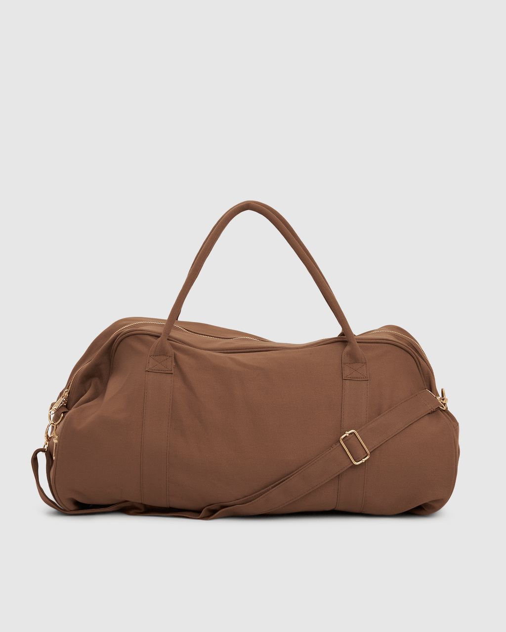 Model wearing Daily Duffle - Chocolate