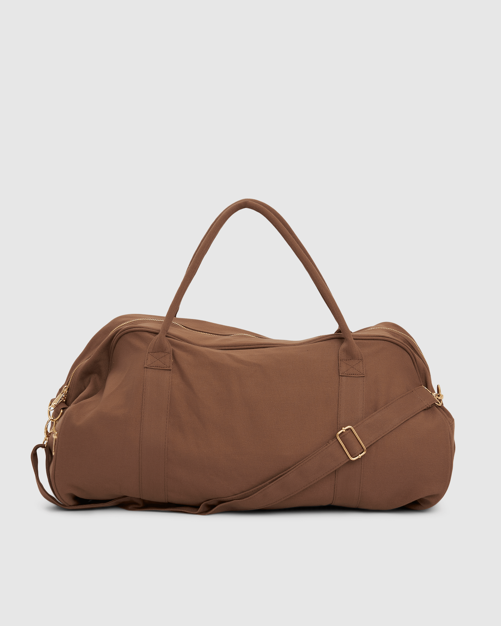 Model wearing Daily Duffle - Chocolate