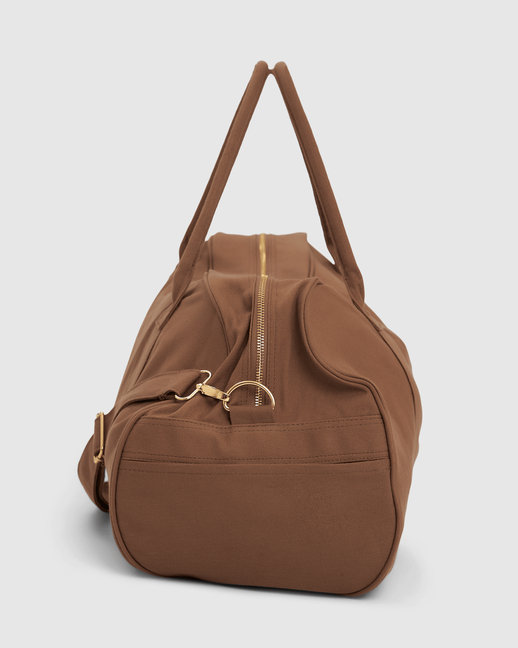 Model wearing Daily Duffle - Chocolate