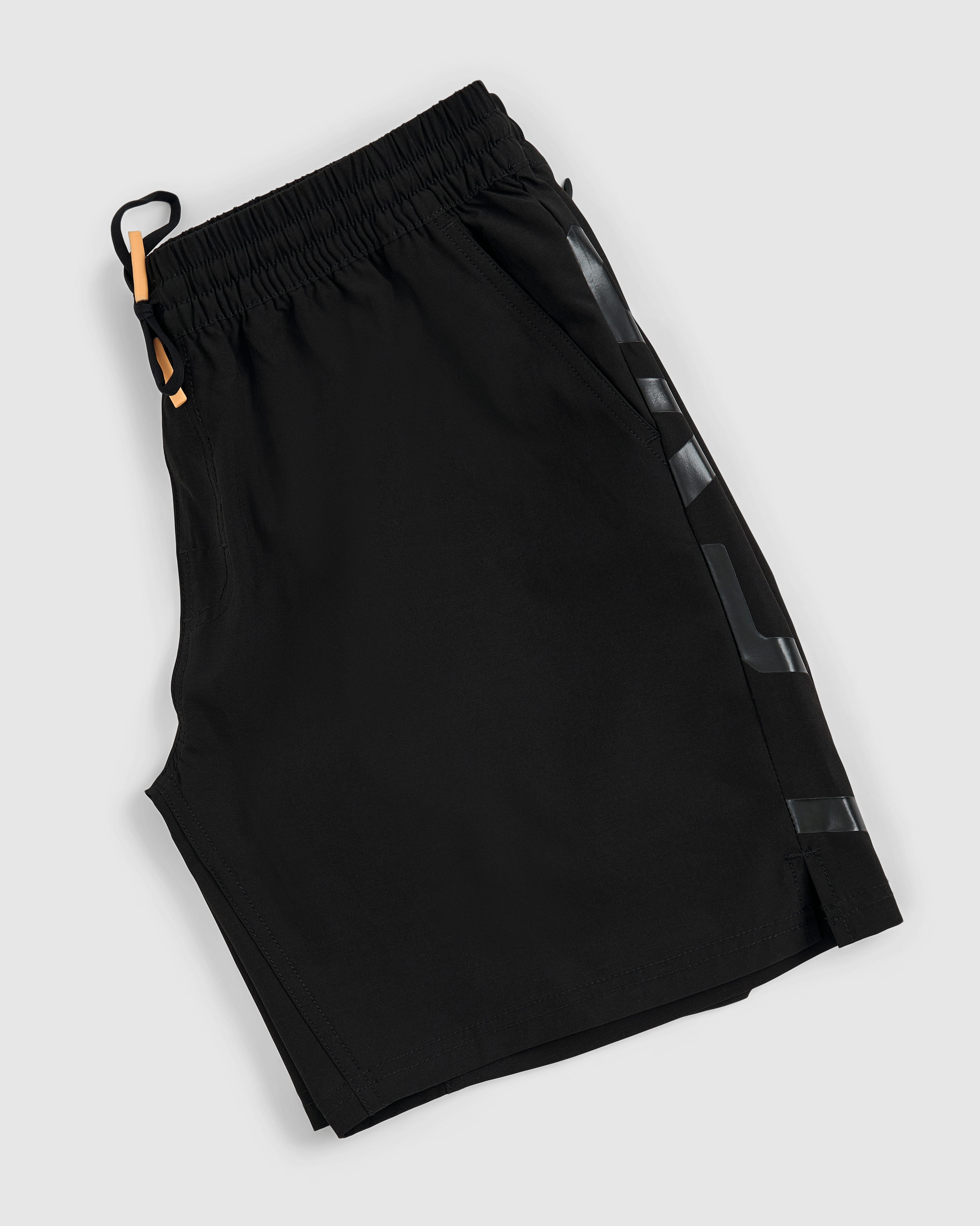 Model wearing Faction 7" Performance Short - Black-Black