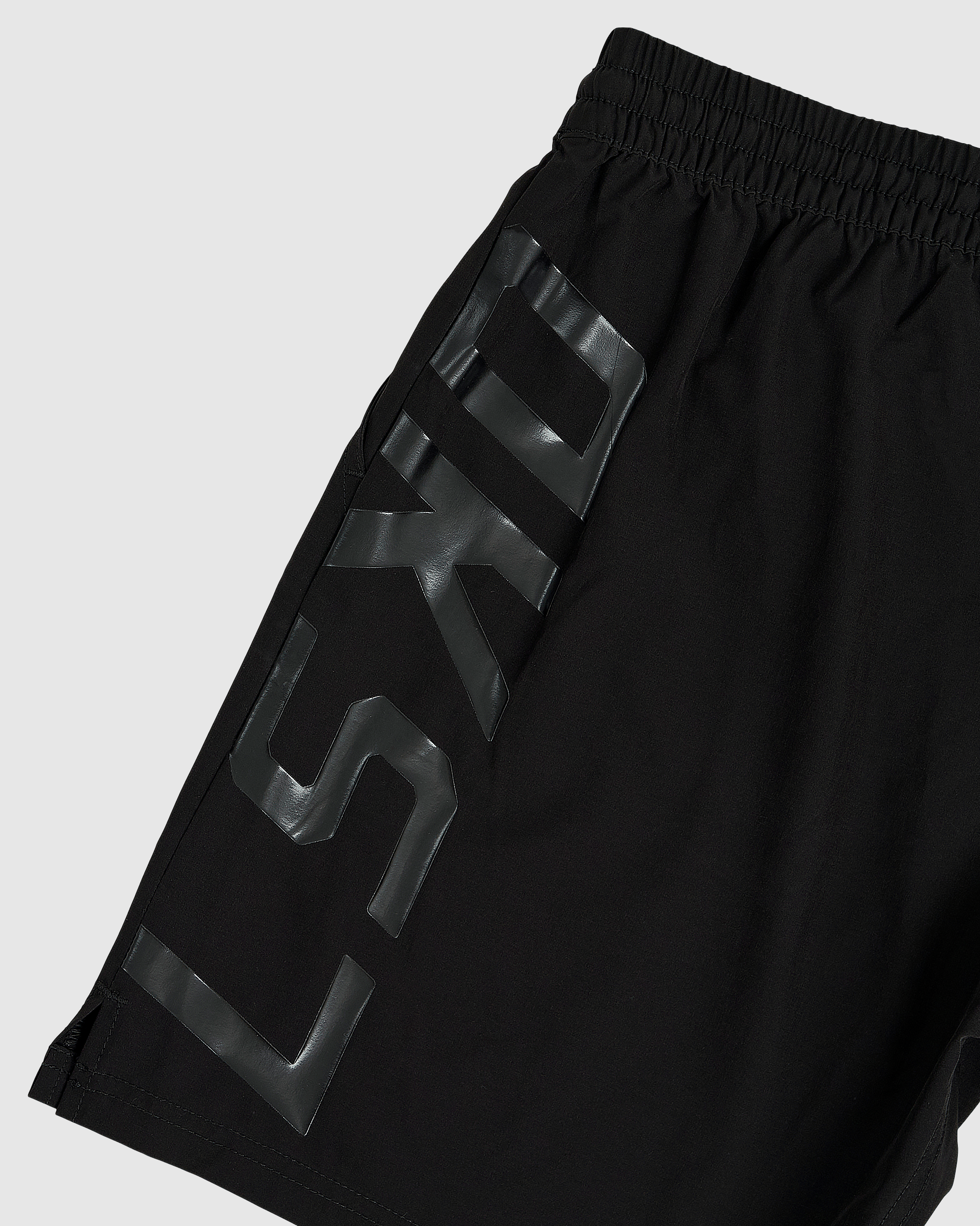 Model wearing Faction 7" Performance Short - Black-Black