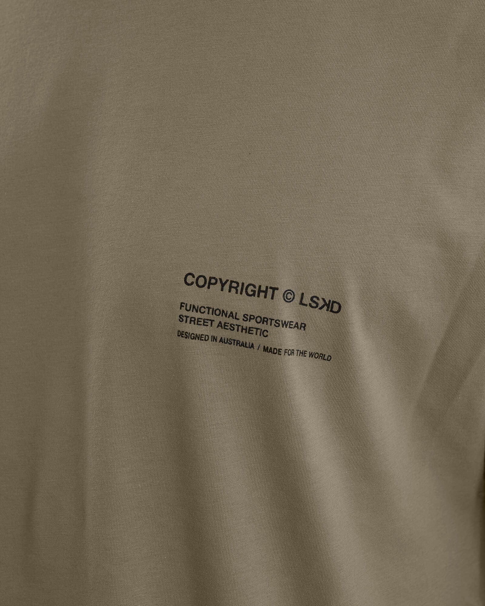 Model wearing Unisex Official Tee Oversize - Laurel Oak