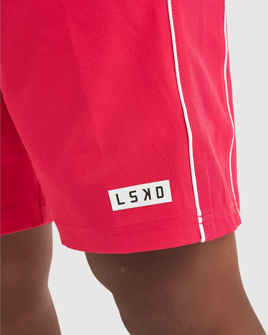 Model wearing Pipeline 7" Short - Boysenberry