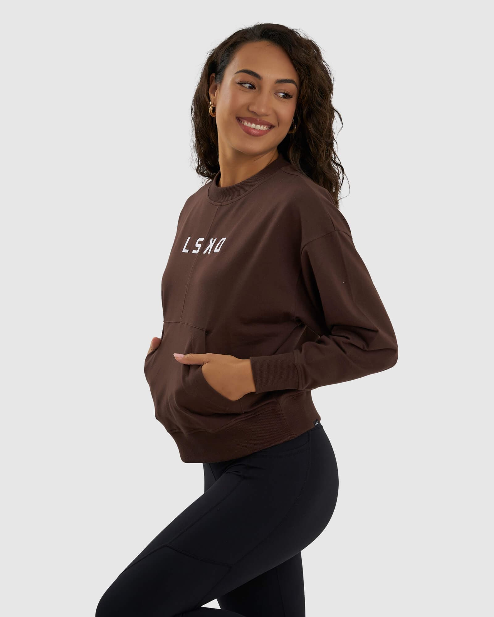 Model wearing Divide Sweater - Walnut