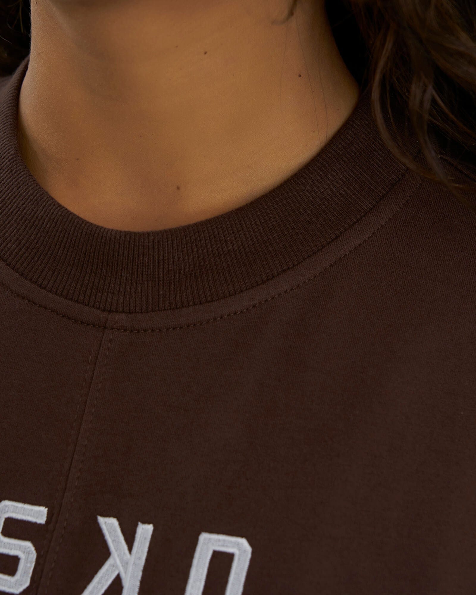 Model wearing Divide Sweater - Walnut