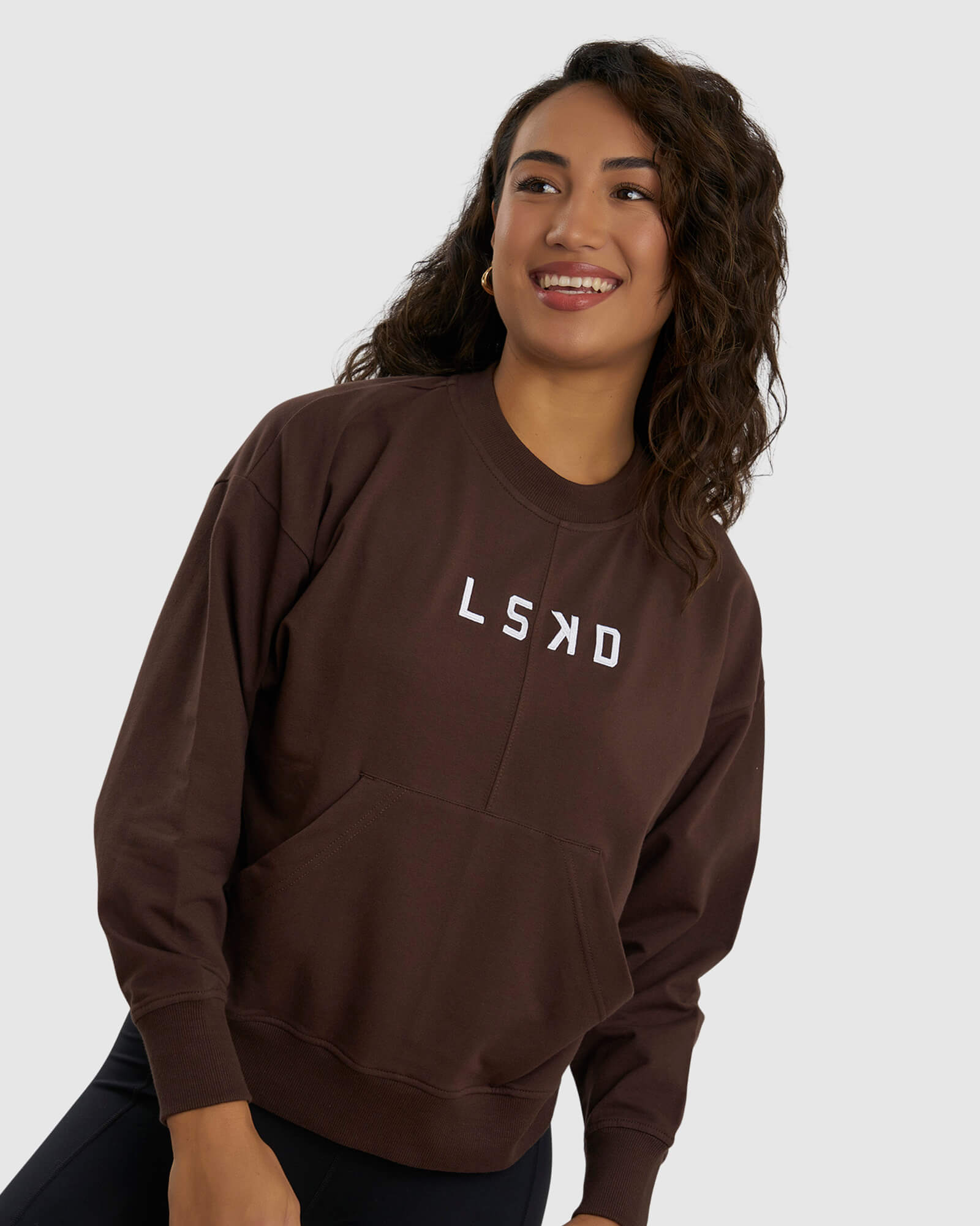 Model wearing Divide Sweater - Walnut