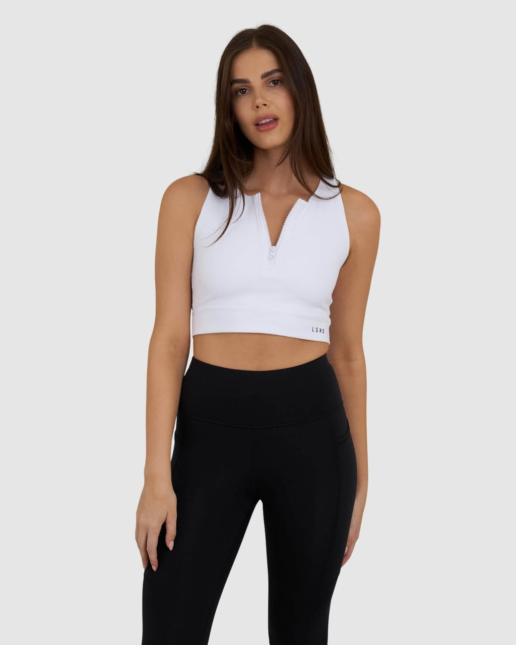 Model wearing Zip Up Tank - White