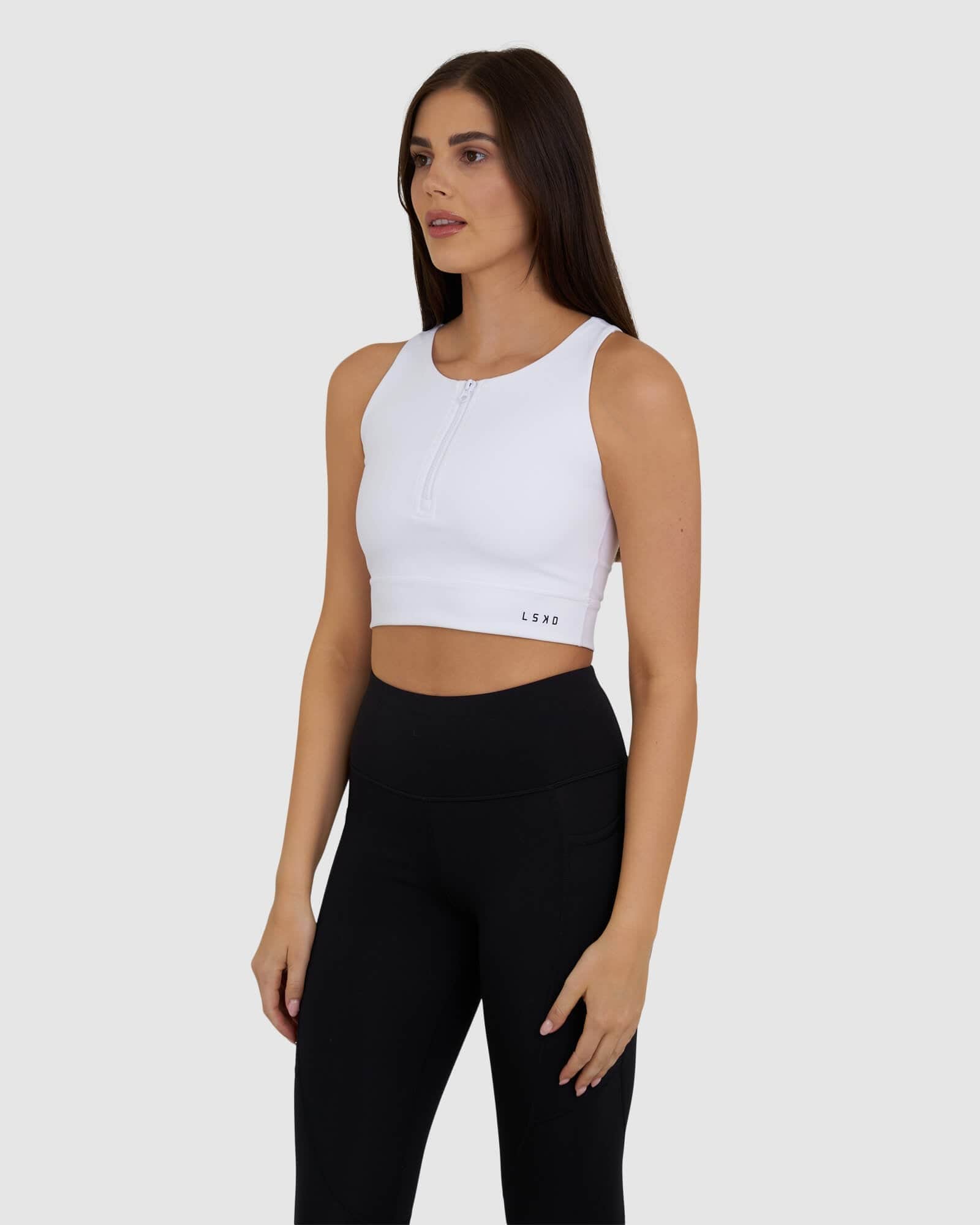 Model wearing Zip Up Tank - White